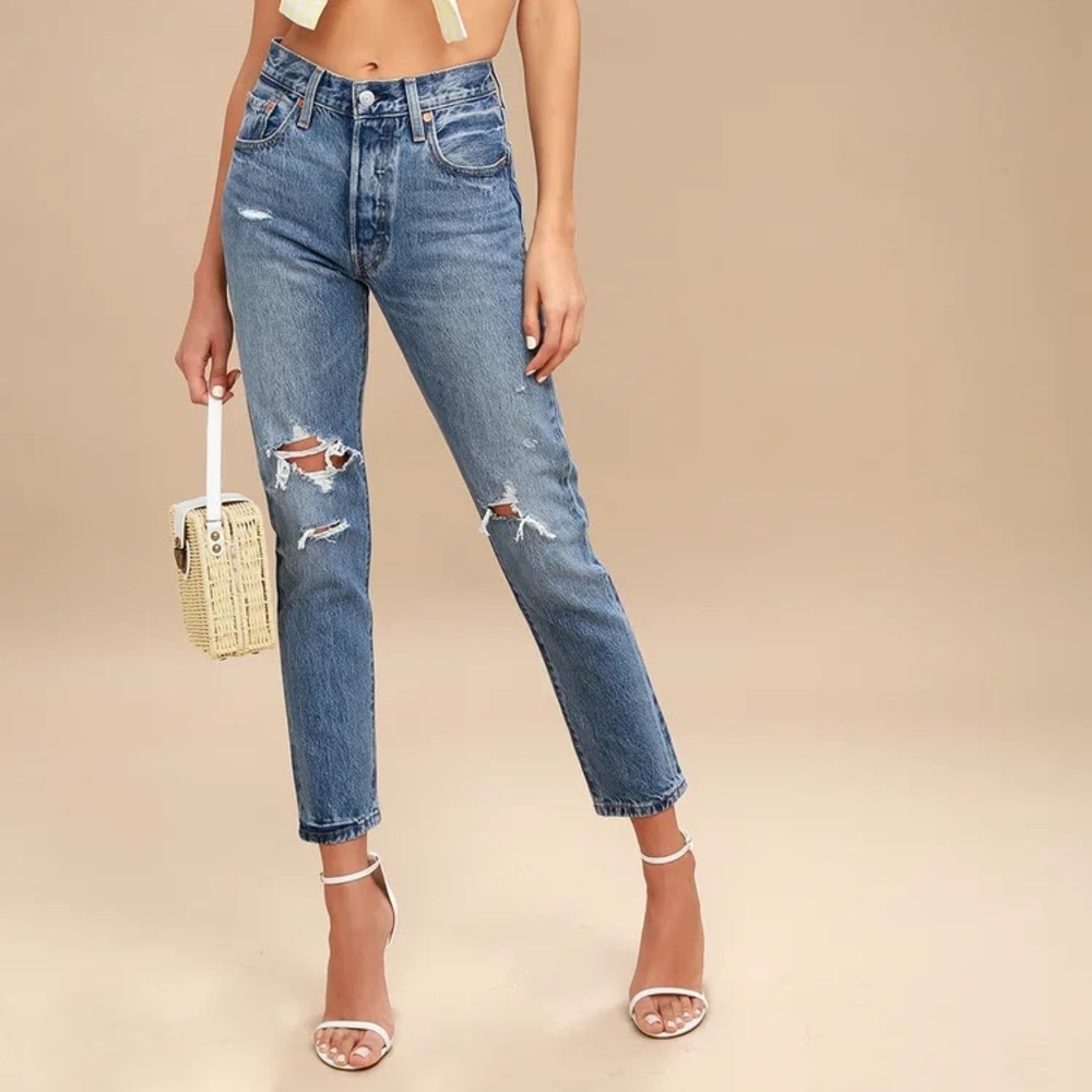 Levi’s 501 light blue distressed jeans